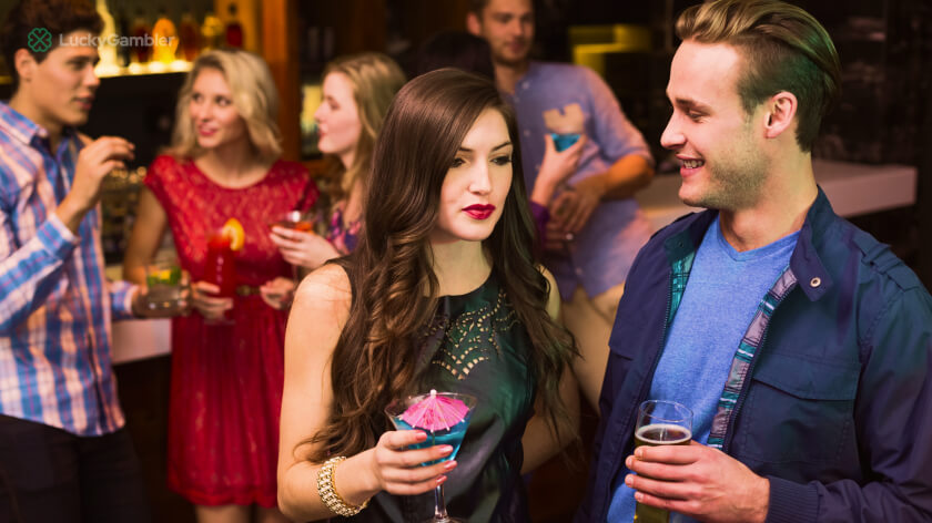 Photo of players interacting and socializing in a casino